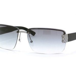 Authentic Gucci Sunglasses. Gucci GG logo in Silver. Black arms. Rimless frames.